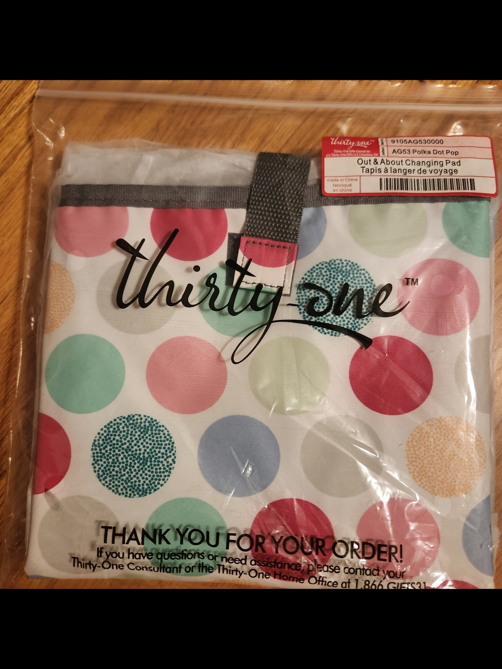 Thirty -One Out And About Changing Pad. Polka Dot Pop